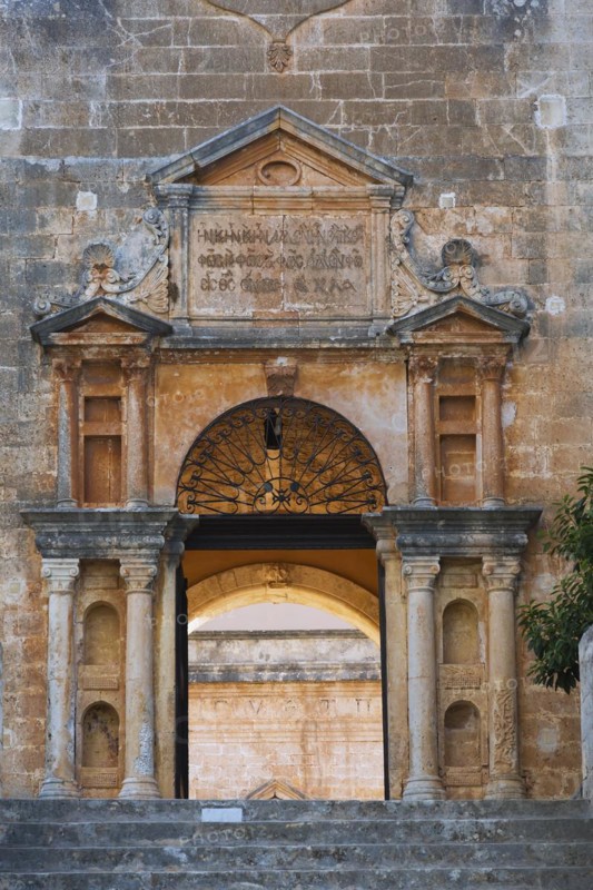 Stone steps and arched entrance with Doric columns at Holy Trinity (Agia Triada) Monastery, Akrotiri Peninsula, Chania region, Crete Island, Greece, Europe
