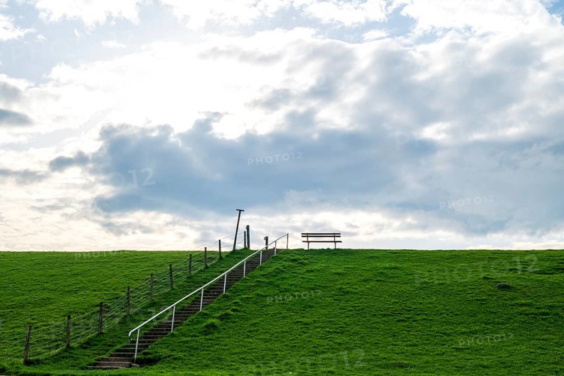Lonely viewing bench on the dyke to the Dollart near Pogum, municipality of Jemgum, district of Leer, Rheiderland, East Frisia, Lower Saxony, Germany, Europe
