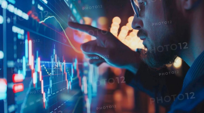 A man is pointing at a graph on a transparent screen showing market and economy trends, AI generated