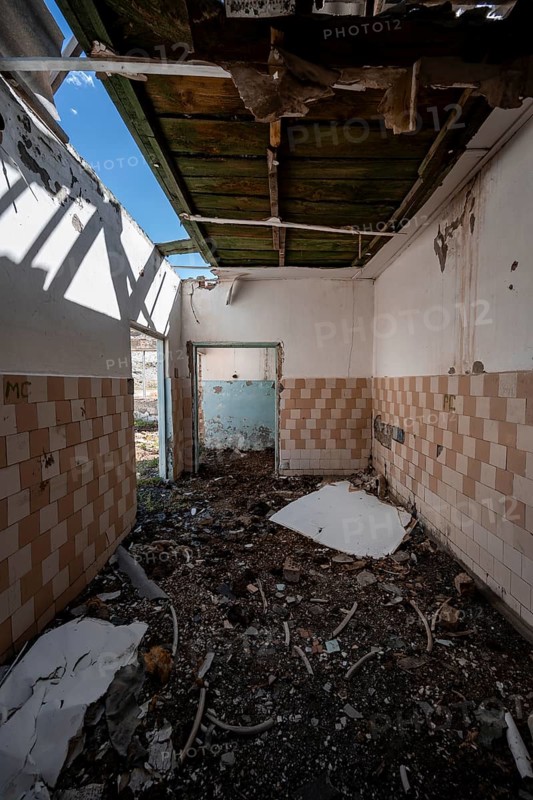 Destroyed abandoned room with tiles full of rubble, ghost town, Engilchek, Tian Shan, Kyrgyzstan, Asia