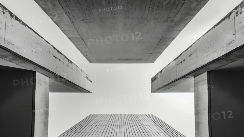 Image of an underpass with strong lines and symmetry in greyscale, highlighting its structure, AI generated