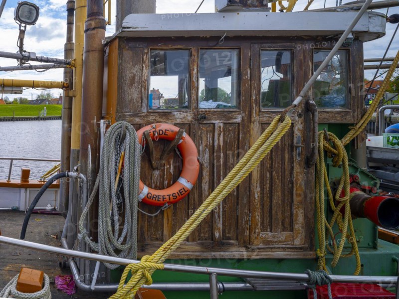 Detail of a fishing boat in Greetsiel harbour, Greetsiel, Krummhoern, East Frisia, Lower Saxony, Germany, Europe