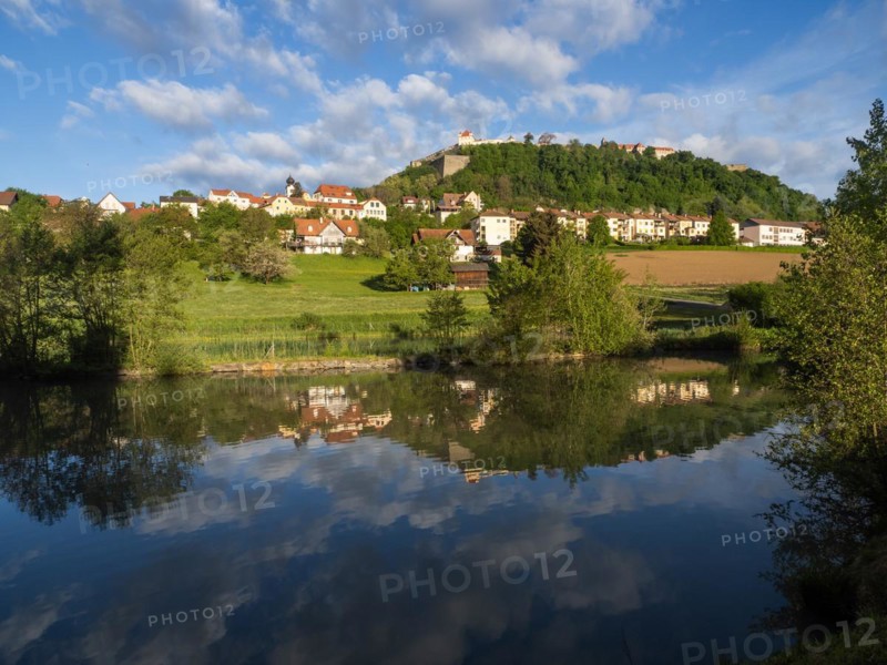 Reflection in a pond, Riegersburg in the morning light, Riegersburg, Styrian volcanic region, Styria, Austria, Europe