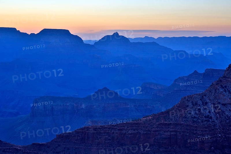The twilight cloaks the Grand Canyon in a deep blue and emphasises the contours, Grand Canyon National Park, South Rim, North America, USA, South-West, Arizona, North America
