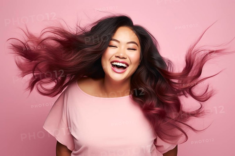 Smiling Asian plus size woman with long pink and black ombre hair. KI generiert, generiert, AI generated