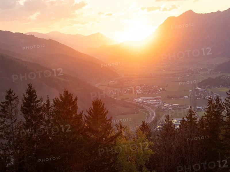 Sunset over the Liesingtal, in the evening light the village of Traboch, Schoberpass federal road, view from the lowlands, Leoben, Styria, Austria, Europe