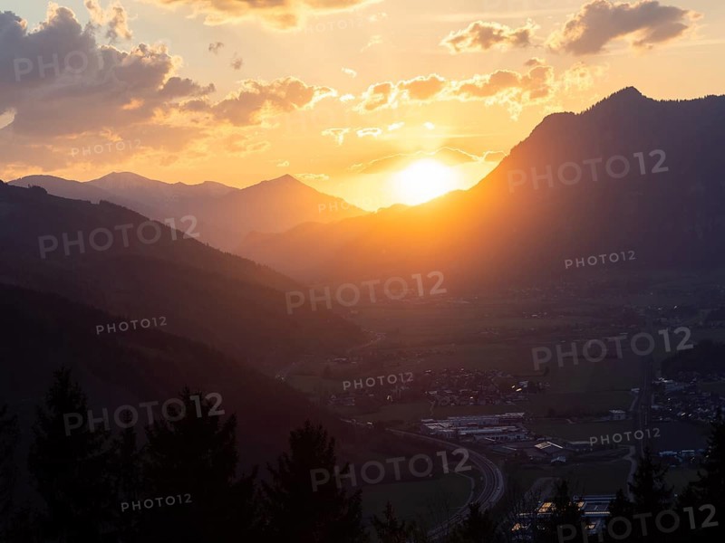 Sunset over the Liesingtal, in the evening light the village of Traboch, Schoberpass federal road, view from the lowlands, Leoben, Styria, Austria, Europe