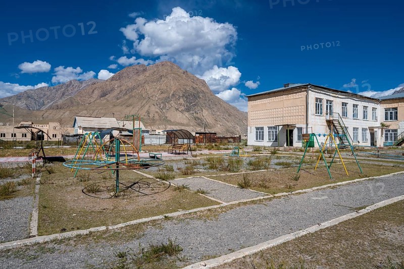 Playground equipment in a playground, ghost town, Engilchek, Tian Shan, Kyrgyzstan, Asia