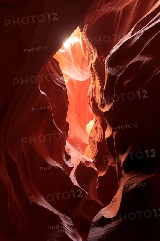Dramatic lighting of a rock formation, centred light creates soft shadows, Upper Antelope Canyon, North America, USA, South-West, Arizona, North America