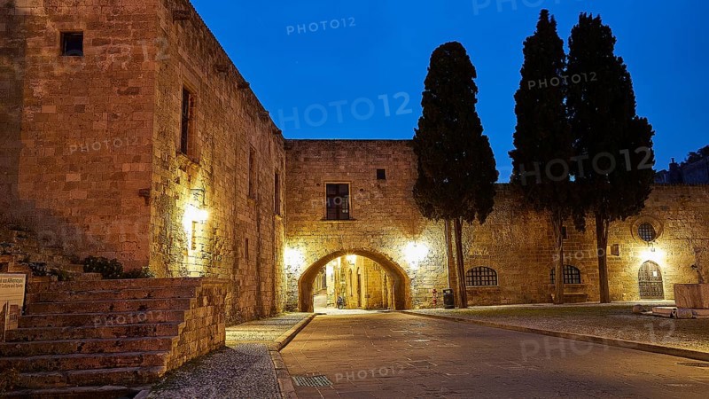 Old stone house in a quiet place, illuminated by street lamps at dusk, night shot, Rhodes Old Town, Rhodes, Dodecanese, Greek Islands, Greece, Europe