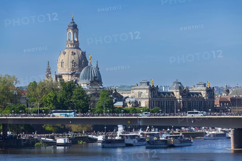 Every year on 1 May, the historic passenger steamers (PD) and the two saloon ships of the White Fleet form a decorated parade with live music on the ships. The banks and bridges of the Elbe are lined with thousands of spectators, Dresden, Saxony, Germany, Europe