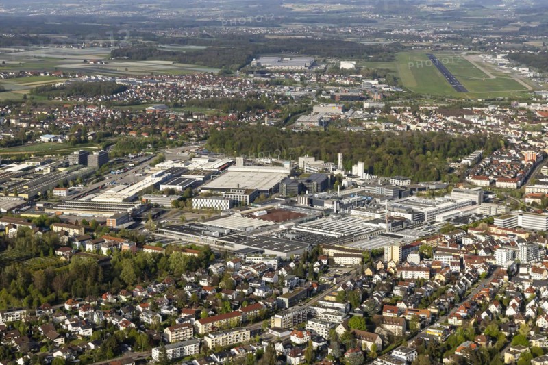 Industrial area with the companies ZF Friedrichshafen, Zeppelin Systems, MTU, Rolls-Royce Solutions, airport and trade fair centre, aerial view, city view of Friedrichshafen, Baden-Wuerttemberg, Germany, Europe