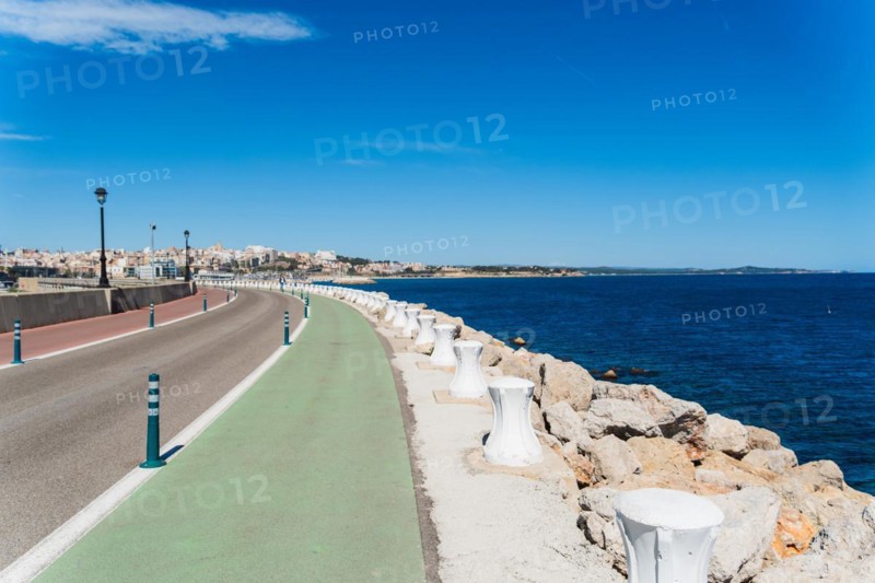 Moll de Llevant waterfront promenade, a 4.5 km long promenade for joggers, walkers, cyclists and skaters at the harbour of Tarragona, Spain, Europe