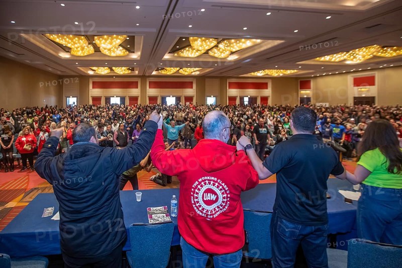 Chicago, Illinois, Shawn Fain (second from left), president of the United Auto Workers union, joins in singing Solidarity Forever at the conclusion of the 2024 Labor Notes conference. That event brought together 4, 700 union activists who are working to revitalize the labor movement