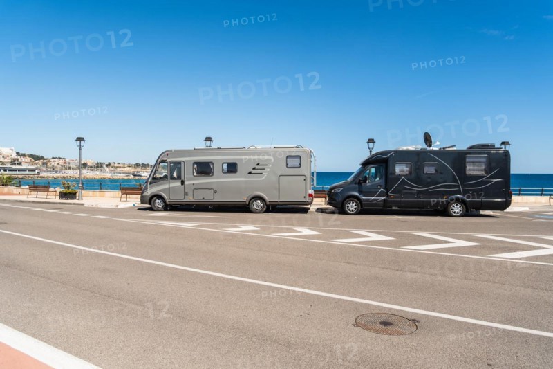 2 mobile homes on the Moll de Llevant promenade, a 4.5 km long promenade for joggers, walkers, cyclists and skaters at the harbour of Tarragona, Spain, Europe