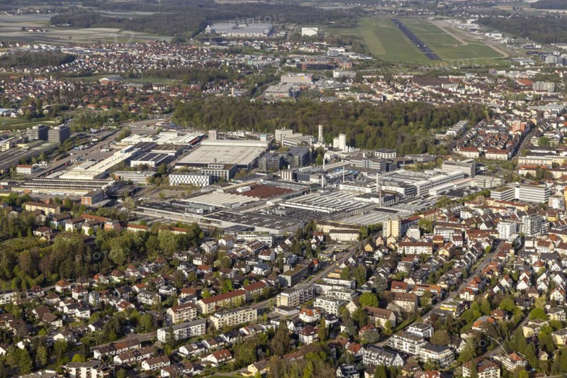 Industrial area with the companies ZF Friedrichshafen, Zeppelin Systems, MTU, Rolls-Royce Solutions, airport and trade fair centre, aerial view, Friedrichshafen, Baden-Wuerttemberg, Germany, Europe