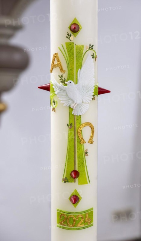 Easter candle from 2024 in the Protestant Reformed Church from 1401, Greetsiel, Krummhoern, East Frisia, Lower Saxony, Germany, Europe