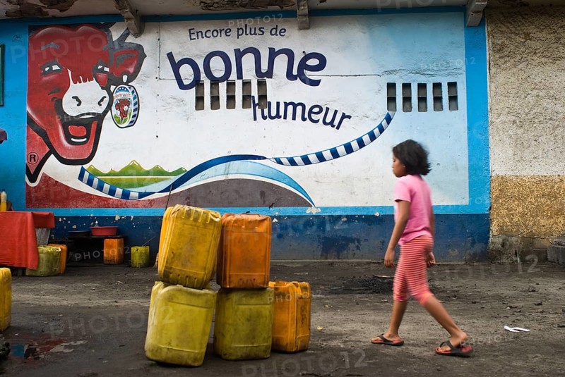 Mural painting, advertisement for cheese called La vache qui rit, Tamatave, Madagascar, Africa
