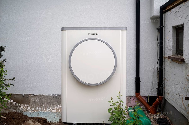 Bosch Compress 7400i AW air-to-water heat pump, logo, outdoor unit, heating hose, pipe, construction site, new build, building services, Stuttgart, Baden-Wuerttemberg, Germany, Europe