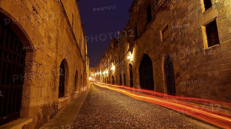 Knights Street, Abandoned medieval street at night with light traces of vehicles, night shot, Rhodes Old Town, Rhodes, Dodecanese, Greek Islands, Greece, Europe