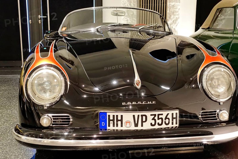 PORSCHE 356 A SPEEDSTER, A black Porsche presented with an eye-catching flame design, AUTOMUSEUM PROTOTYP, Hamburg, Hanseatic City of Hamburg, Germany Europe