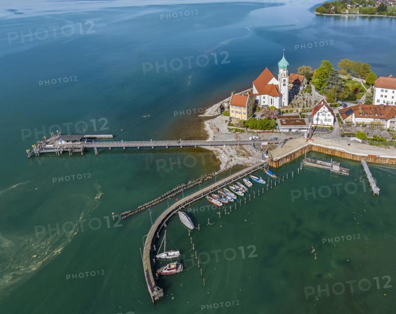 Moated castle peninsula with castle and parish church of St George on Lake Constance. Aerial view, moated castle, Bavaria, Germany, Europe