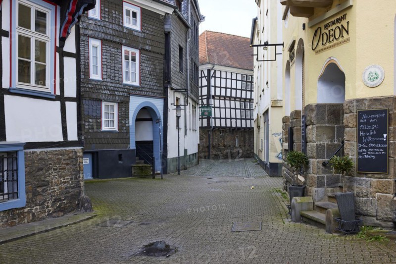 Entrance to the church square, Odeon restaurant and the rear of the historic town hall in Hattingen, Ennepe-Ruhr district, North Rhine-Westphalia, Germany, Europe