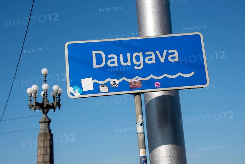 Sign with the inscription Daugava, flows through Russia, Belarus and Latvia, flows into the Baltic Sea after 1200 kilometres, Riga, Latvia, Europe