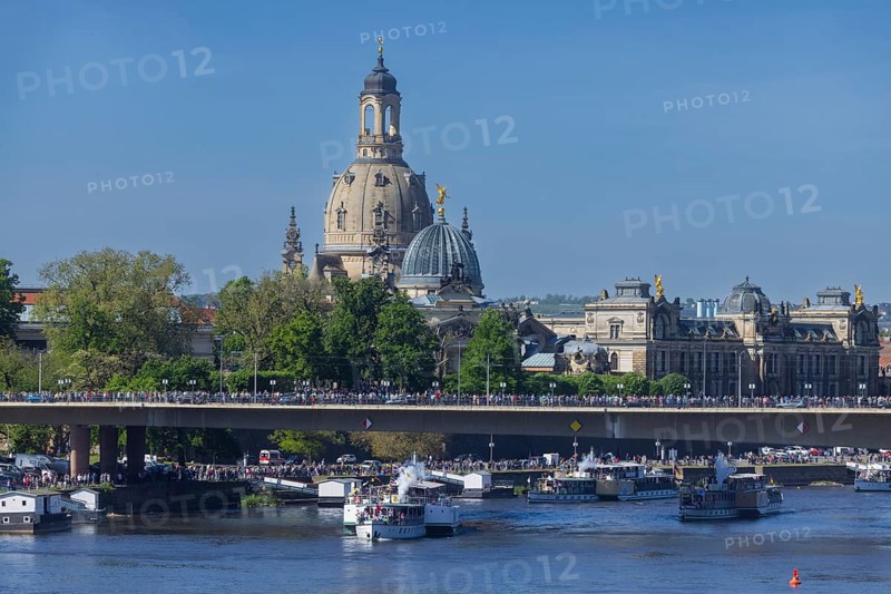 Every year on 1 May, the historic passenger steamers (PD) and the two saloon ships of the White Fleet form a decorated parade with live music on the ships. The banks and bridges of the Elbe are lined with thousands of spectators, Dresden, Saxony, Germany, Europe