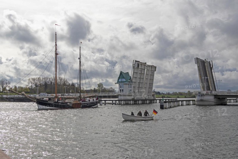 Sailing ship passes through open bascule bridge, Kappeln, Schlei, Schleswig-Holstein, Germany, Europe