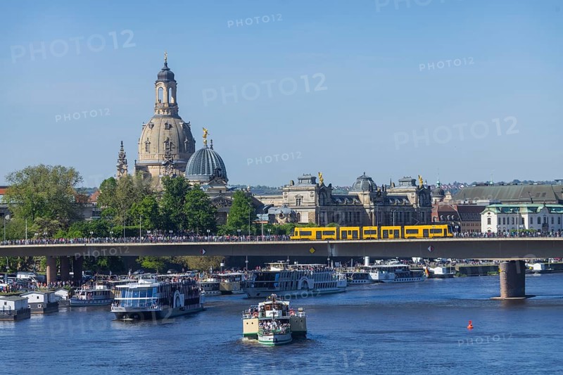 Every year on 1 May, the historic passenger steamers (PD) and the two saloon ships of the White Fleet form a decorated parade with live music on the ships. The banks and bridges of the Elbe are lined with thousands of spectators, Dresden, Saxony, Germany, Europe