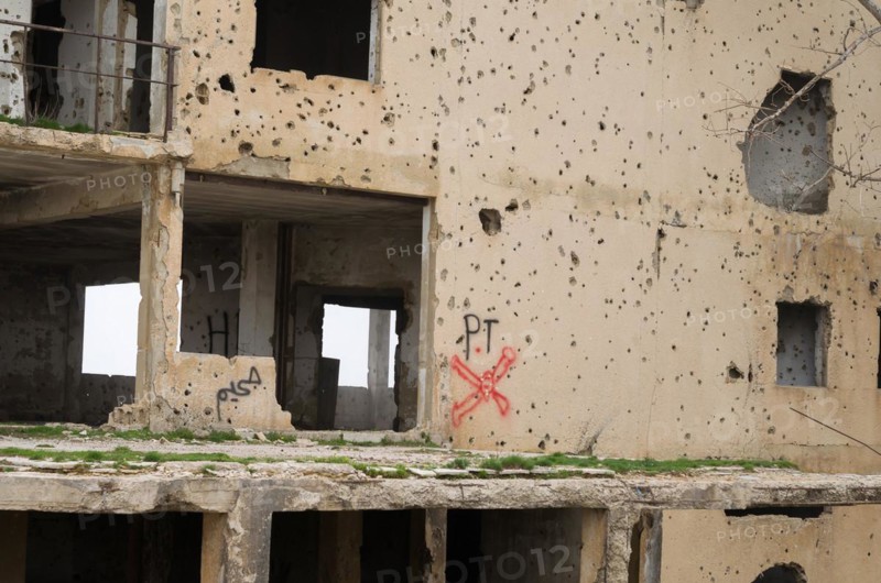 Beqaa, Lebanon, April 04, 2017: Marks of War, Lebanese house machine-gunned, bombed, destroyed by civil war, Lebanon mountains, Asia