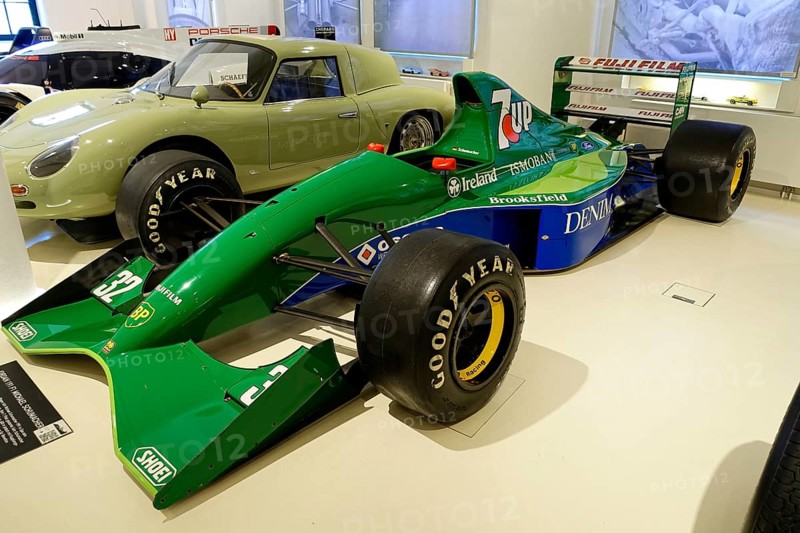 JORDAN 191 F1 MICHAEL SCHUHMACHER, A green Jordan Formula 1 racing car with sponsors in a showroom, AUTOMUSEUM PROTOTYP, Hamburg, Hanseatic City of Hamburg, Germany Europe