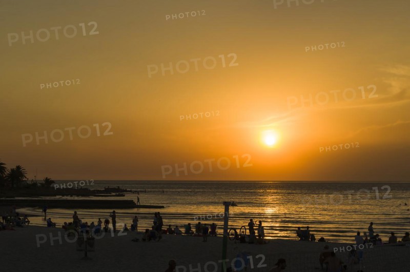 Montevideo, Uruguay, 11th January 2022, Beautiful sunset on Ramires beach with bathers on a summer day in Montevideo Uruguay, South America