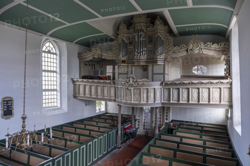 Protestant Reformed Church from 1401, interior with pews and organ prospectus above the east entrance, Greetsiel, Krummhoern, East Frisia, Lower Saxony, Germany, Europe