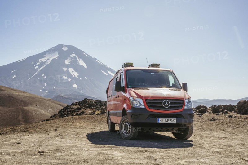 Campervan in front of the Lonquimay volcano, Lonquimay volcano, Malalcahuello National Reserve, Curacautin, Araucania, Chile, South America