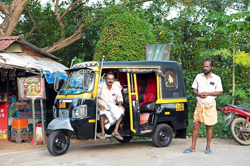 Tuk Tuk driver in Kavanattinkara, Backwaters, Kerala, India, Asia