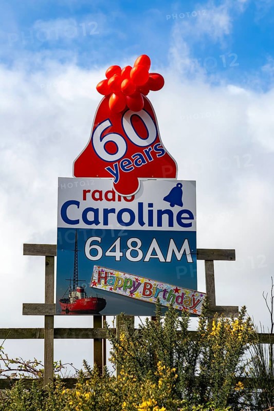 Radio Caroline pirate radio station 60 years old happy birthday balloons and poster, Suffolk, England, UK