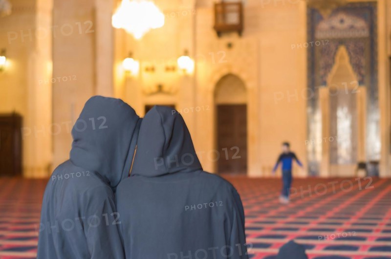 Beirut, Lebanon, April 03, 2017: Women praying inside the mosque of Mohammad Al-Amin Mosque in Beirut Lebanon, Asia