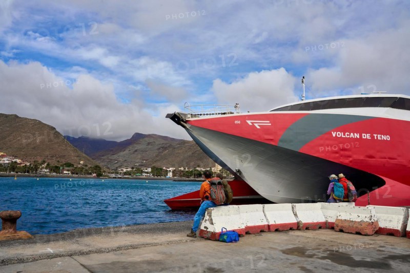 Travellers waiting at the ferry from San Sebstian de la Gomera to los Christianos on Tenerife, San Sebastian de La Gomera, La Gomera, Canary Islands, Spain, Europe