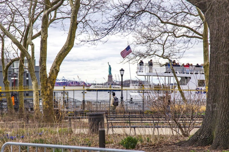 View from Battery Park, the southernmost point of Manhattan, to the Statue of Liberty, Lower Manhattan, New York City