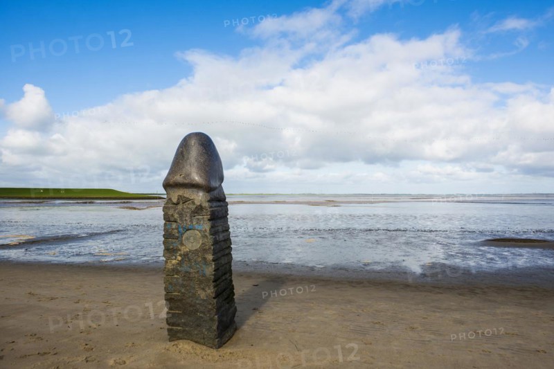 Stone sculpture on the beach and Wadden Sea, penis, artist Eckart Grenzer, Dangast, Jade Bay, North Sea, Lower Saxony, Germany, Europe
