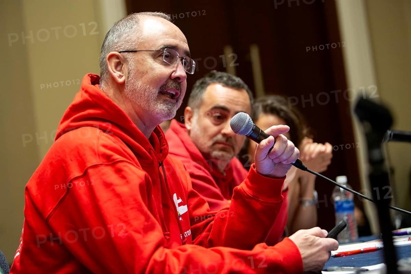 Chicago, Illinois, Shawn Fain, president of the United Auto Workers union, speaks at a workshop during the 2024 Labor Notes conference. That event brought together 4, 700 union activists who are working to revitalize the labor movement. With Fain is Michele De Palma, general secretary of the Italian metalworkers union
