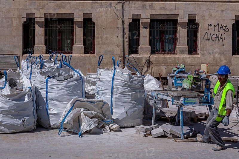 Construction workers with yellow safety waistcoats, Cadiz, Andalusia, Spain, Europe