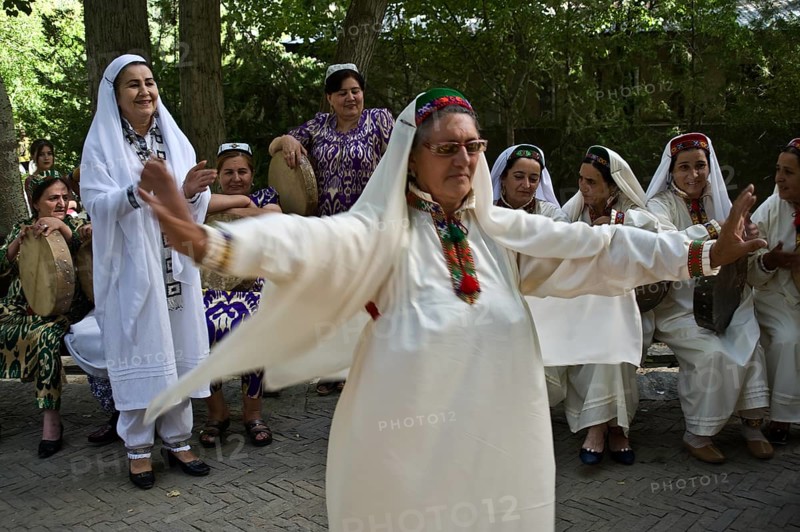 Pamiri woman performing a dance, roof of the world festival, Khorog, Tajikistan, Central Asia. All the women are nizari ismaili, Asia