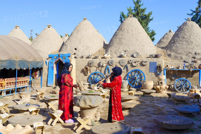 Women in the courtyard, Harran, Turkey, Asia
