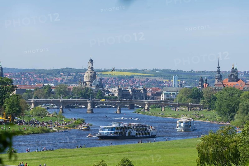 Every year on 1 May, the historic passenger steamers (PD) and the two saloon ships of the White Fleet form a decorated parade with live music on the ships. The banks and bridges of the Elbe are lined with thousands of spectators. Salon ships August the Strong and Countess Cosel, Dresden, Saxony, Germany, Europe