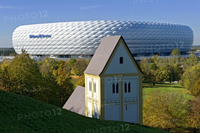 Allianz Arena, football stadium of FC Bayern Munich, copy of the Romanesque pilgrimage church of the Holy Cross, art object sunken village by Timm Ulrichs, art in architecture, Froettmaninger Berg, Froettmaning, Munich, Upper Bavaria, Bavaria, Germany, Europe