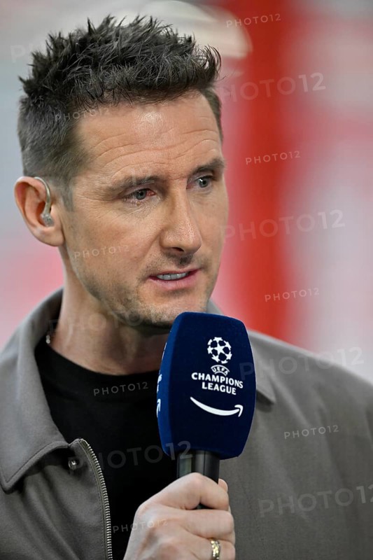TV expert Miroslav Klose in an interview, microphone, microphone, logo, portrait, Champions League CL, Allianz Arena, Munich, Bavaria, Germany, Europe