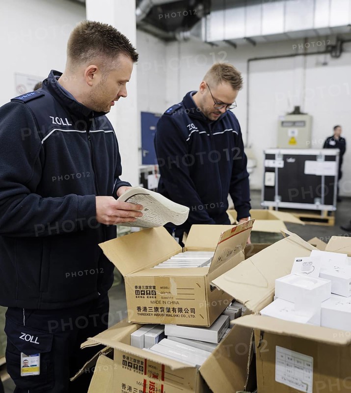Customs officers check a load of an aircraft that has landed in the cargo area at the airport, Frankfurt am Main, 03/05/2024